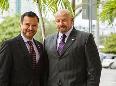 Commissioner Rusell talks to a resident about her concerns